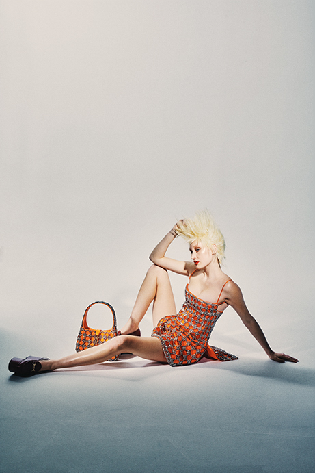 Prada Tulle Dress $8,100, Gucci Silk Duchesse Dress with Net Crystal Embroidery $24,000, Gucci Embellished Jackie Bag $14,000, Gucci Horsebit Platform Loafers $1,490