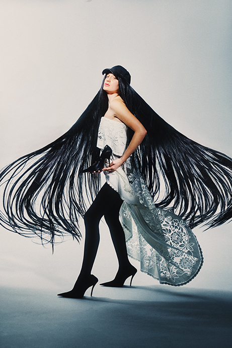 Balenciaga upcycled-tablecloth dress $2,790, bustier Pantabodysuit $4,150, embossed Unity cap $495, and knife clutch $1,890, at the Balenciaga boutique, Neiman Marcus, Saks Fifth Avenue. 