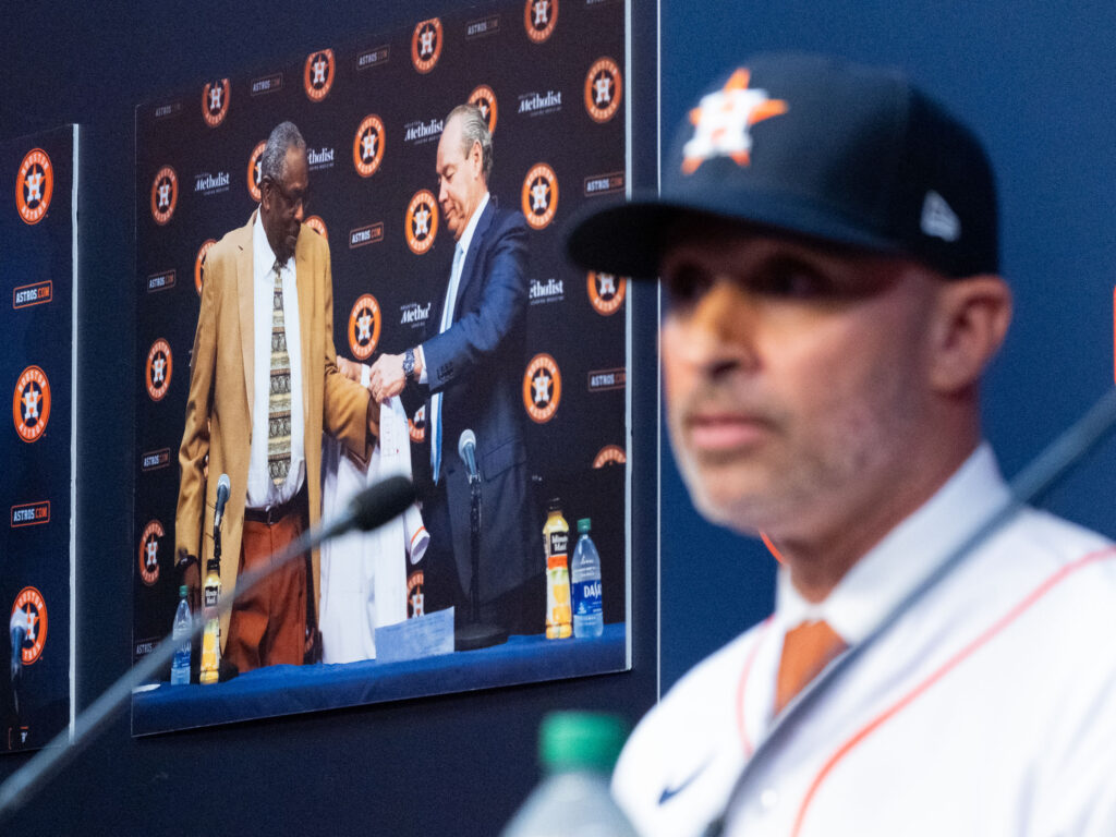 New Astros manager Joe Espada had the reminder of Dusty Baker over his shoulder at his introductory press conference. Yes, the expectations are supersized. (Photo by F. Carter Smith)