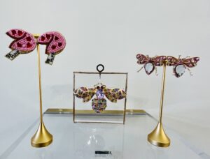 Bricks – Dos Femmes has over 120 seasonal beaded earring designs. (Photo by Courtney Dabney)