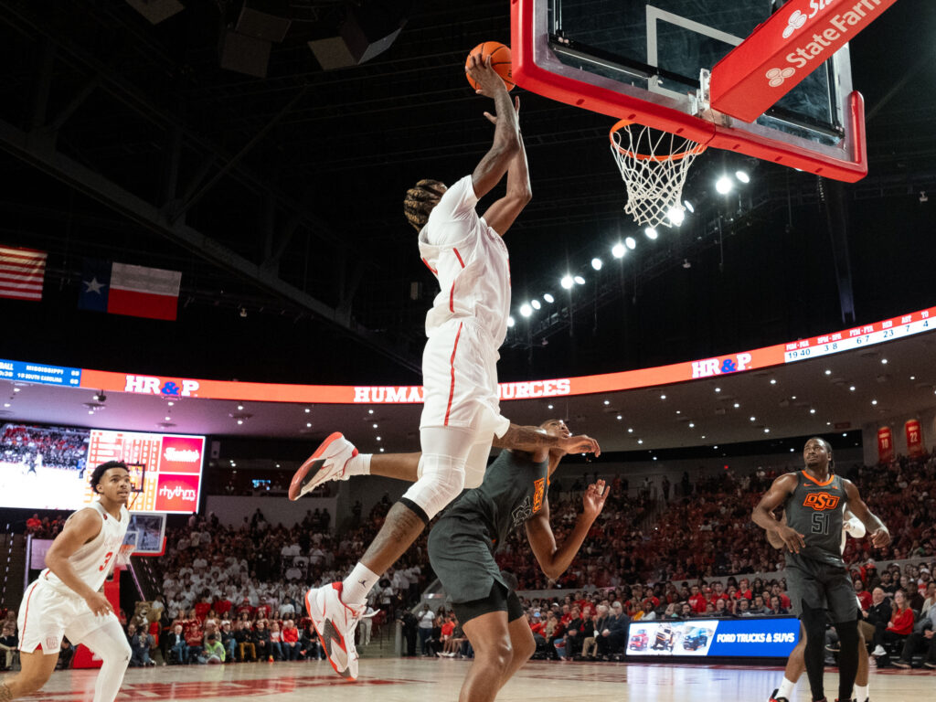 UH center Ja'Vier Center is a high flying dunker. (Photo by F. Carter Smith)