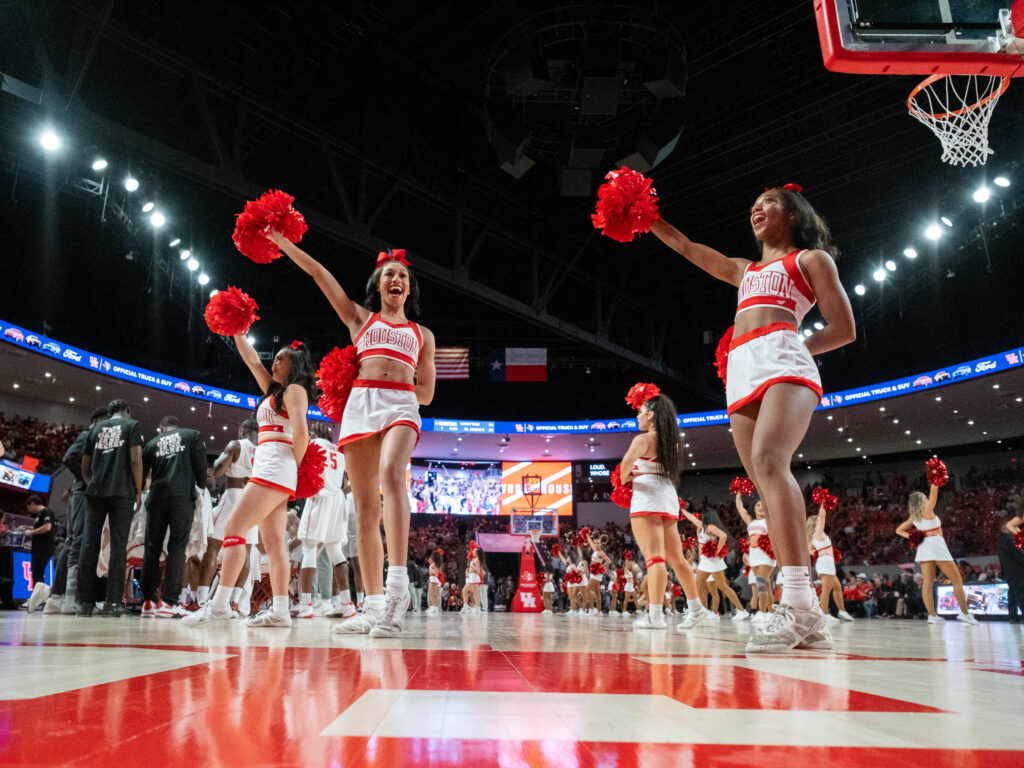 University of Houston cheerleaders add to the Fertitta Center atmosphere. (Photo by F. Carter Smith)