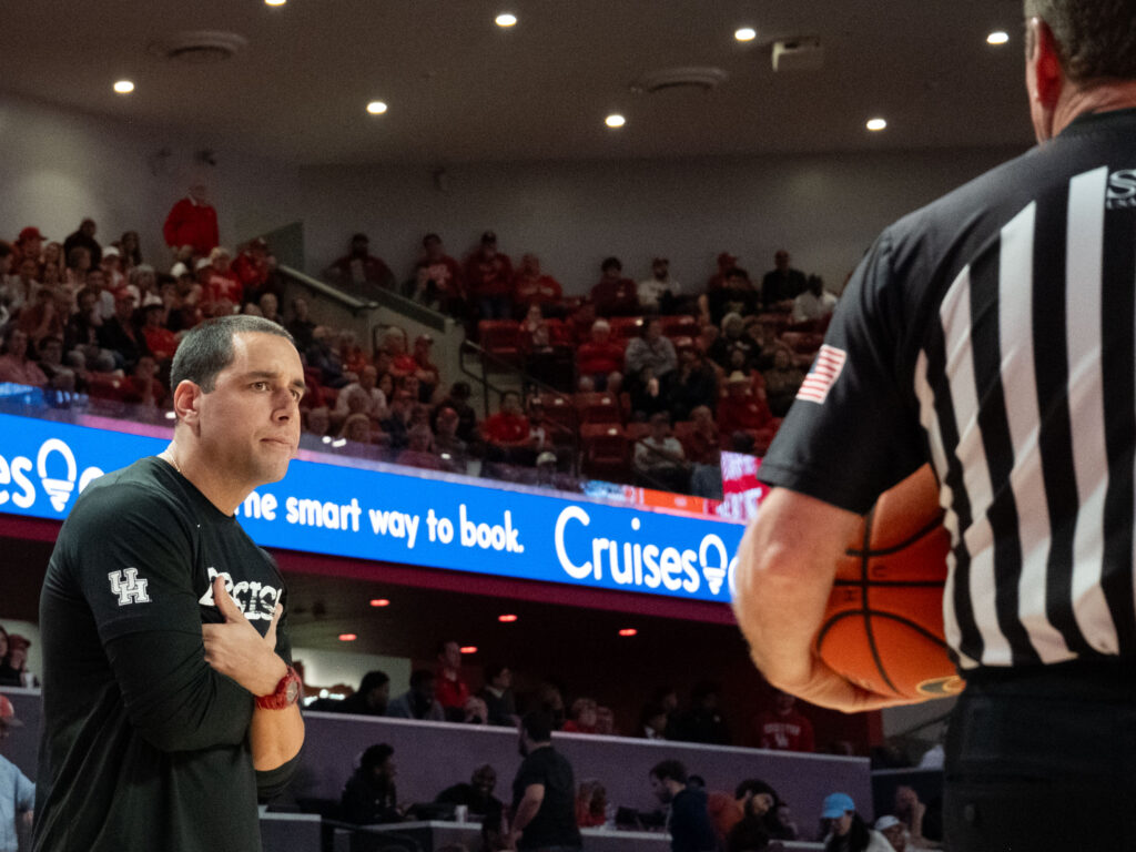 UH assistant coach Kellen Sampson took over for his dad on the sidelines and gave the refs some messages of his own. (Photo by F. Carter Smith)