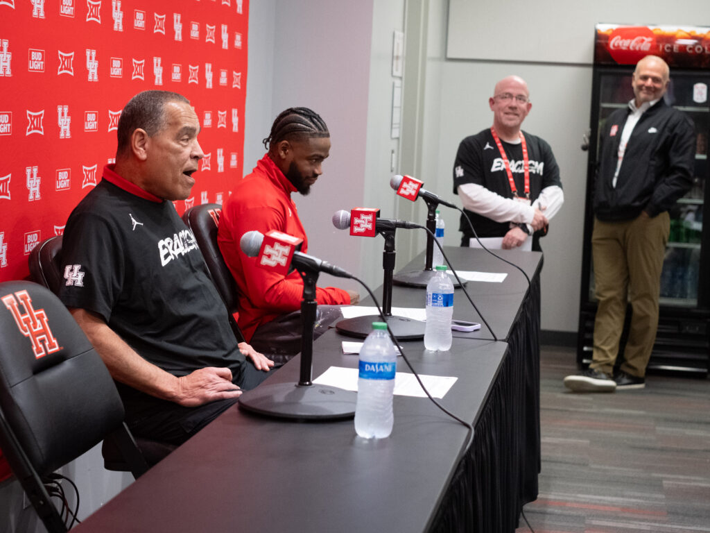 UH point guard Jamal Shead and and athletic director Chris Pezman enjoyed Kelvin Sampson's post ejection press conference. (Photo by F. Carter Smith)