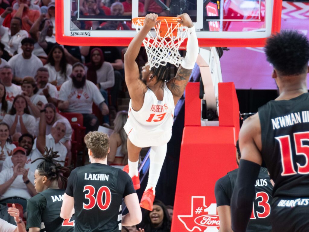 J'Wan Roberts attacks rims with a fury for Kelvin Sampson's Houston team. (Photo by F. Carter Smith)