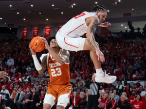 The #3 Houston Cougars defeated the Texas Longhorns in an 82-61 wire-to-wire win behind 26 points from guard L.J. Cryer . The Cougars used a big second half to hold Texas to a season-low scoring mark at the Fertitta Center