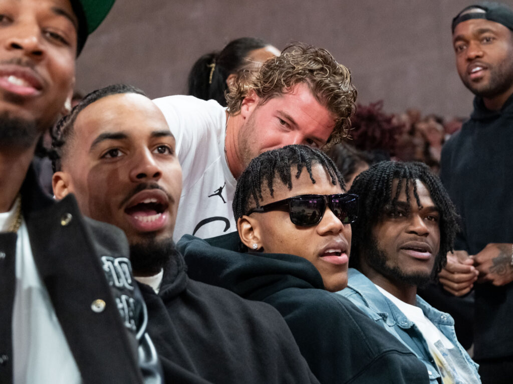 Kyler Edwards. Marcus Sasser (shades) and Jarace Walker all came back to enjoy University of Houston basketball. (Photo by F. Carter Smith)