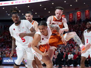 The #3 Houston Cougars defeated the Texas Longhorns in an 82-61 wire-to-wire win behind 26 points from guard L.J. Cryer . The Cougars used a big second half to hold Texas to a season-low scoring mark at the Fertitta Center