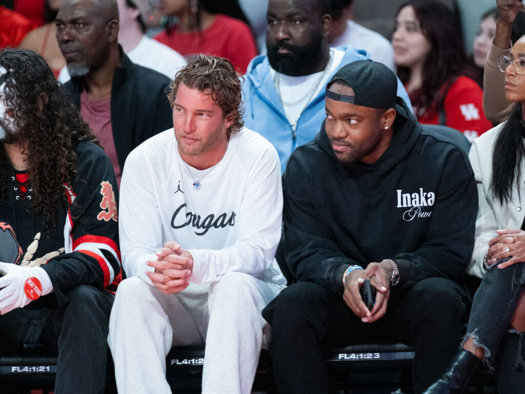 Landon Goesling (left) has the Cougars NIL rolling and NBA player turned Kendrick Perkins (center in blue) knows the Fertitta Center is the place to be. (Photo by F. Carter Smith)