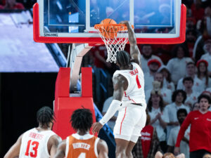 The #3 Houston Cougars defeated the Texas Longhorns in an 82-61 wire-to-wire win behind 26 points from guard L.J. Cryer . The Cougars used a big second half to hold Texas to a season-low scoring mark at the Fertitta Center