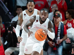 The #3 Houston Cougars defeated the Texas Longhorns in an 82-61 wire-to-wire win behind 26 points from guard L.J. Cryer . The Cougars used a big second half to hold Texas to a season-low scoring mark at the Fertitta Center