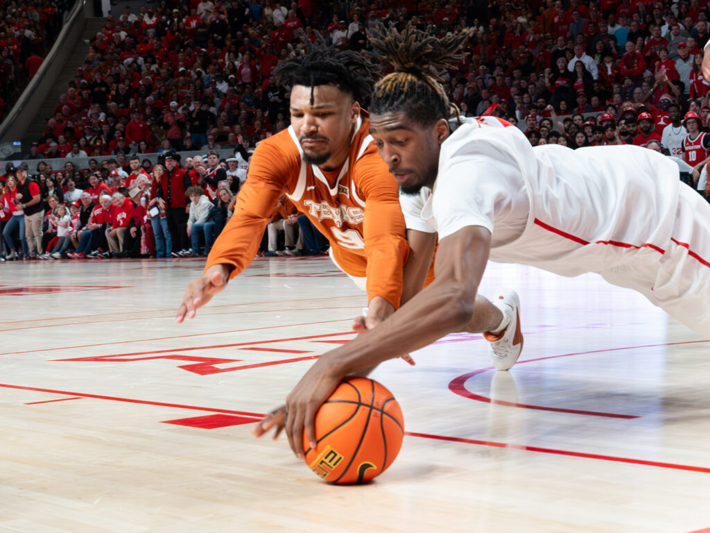 UH center Ja'Vier Francis knows you need to go to the floor and compete to play for Kelvin Sampson. (Photo by F. Carter Smith)