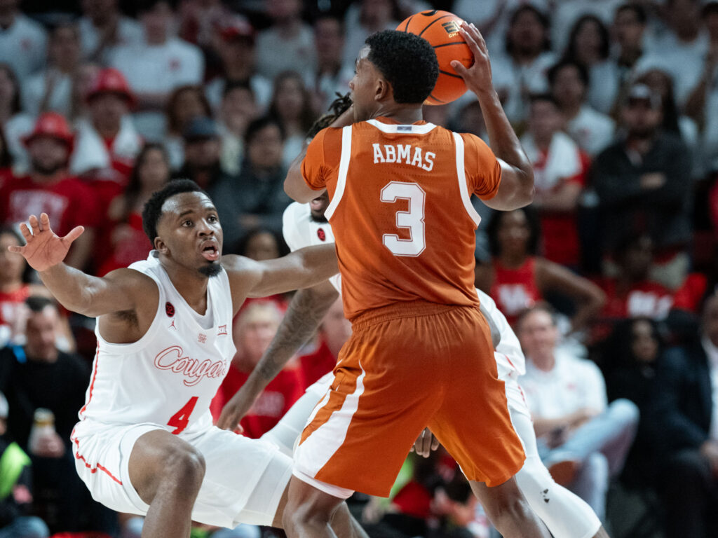 The intensity of LJ Cryer and Jamal Shead's defense hounded Texas guard Max Abmas into 2 for 14 shooting. (Photo by F. Carter Smith)