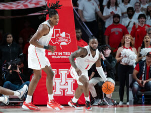 The #3 Houston Cougars defeated the Texas Longhorns in an 82-61 wire-to-wire win behind 26 points from guard L.J. Cryer . The Cougars used a big second half to hold Texas to a season-low scoring mark at the Fertitta Center