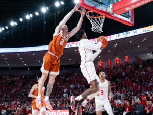 The #3 Houston Cougars defeated the Texas Longhorns in an 82-61 wire-to-wire win behind 26 points from guard L.J. Cryer . The Cougars used a big second half to hold Texas to a season-low scoring mark at the Fertitta Center