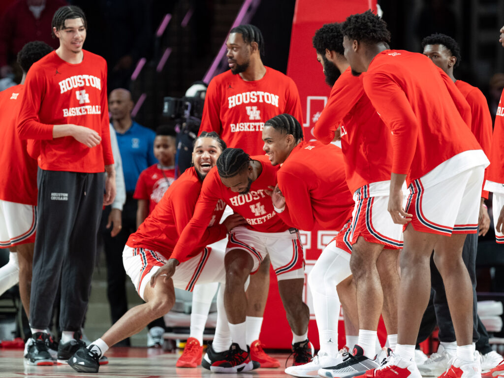 University of Houston point guard Jamal Shead carries the Cougars so often that his teammates want to lift him up too. (Photo by F. Carter Smith)