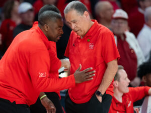 University of Houston associate head coach Quannas White and Kelvin Sampson have been together for a long time. (Photo by F. Carter Smith)
