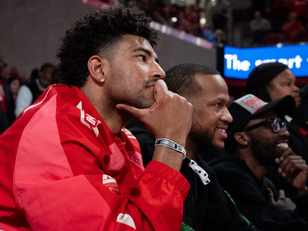 Quentin Grimes (red jacket), Justin Gorham and DeJon Jarreau always come back to the Fertitta Center. (Photo by F. Carter Smith)
