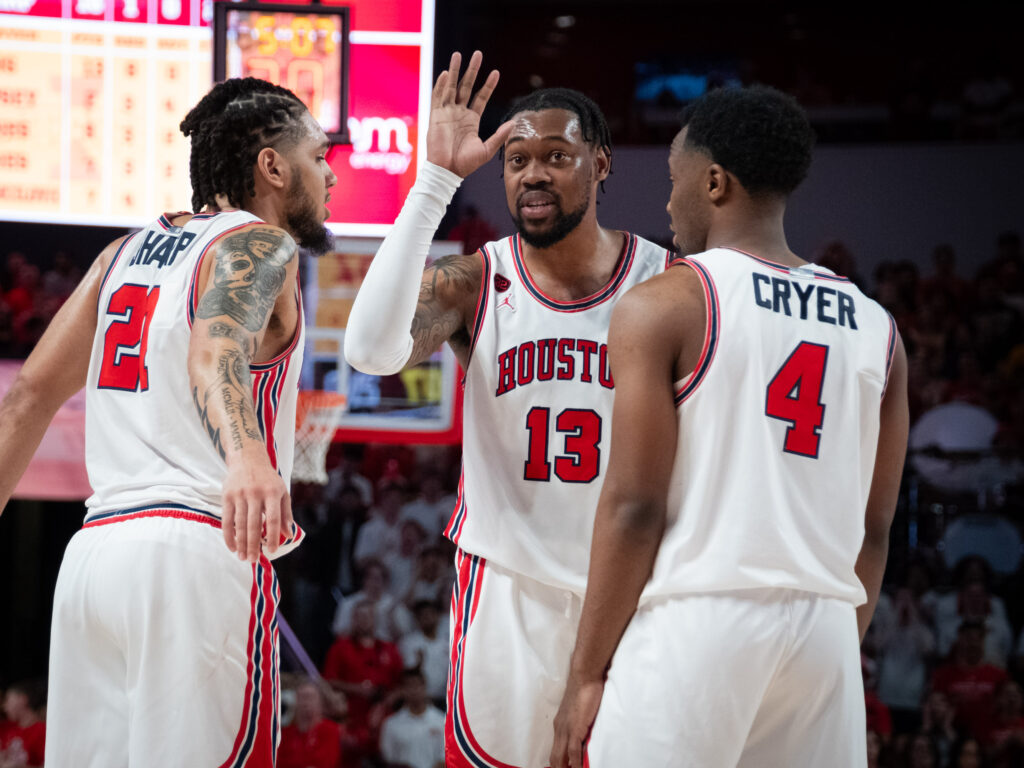 University of Houston players Emanuel Sharp, J'Wan Roberts and LJ Cryer know this team has a special bond. (Photo by F. Carter Smith)