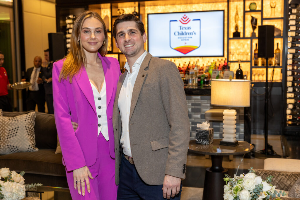 Dana Wempe & Blake Fertitta at the Texas Children's Houston Open Tee-Off in the penthouse suite at the Post Oak Hotel.  (Photo by Jenny Antill)