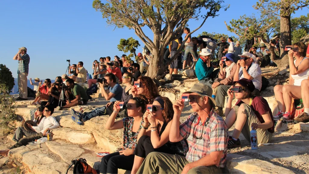 People experiencing a solar eclipse with proper eye protection. (National Park Service)