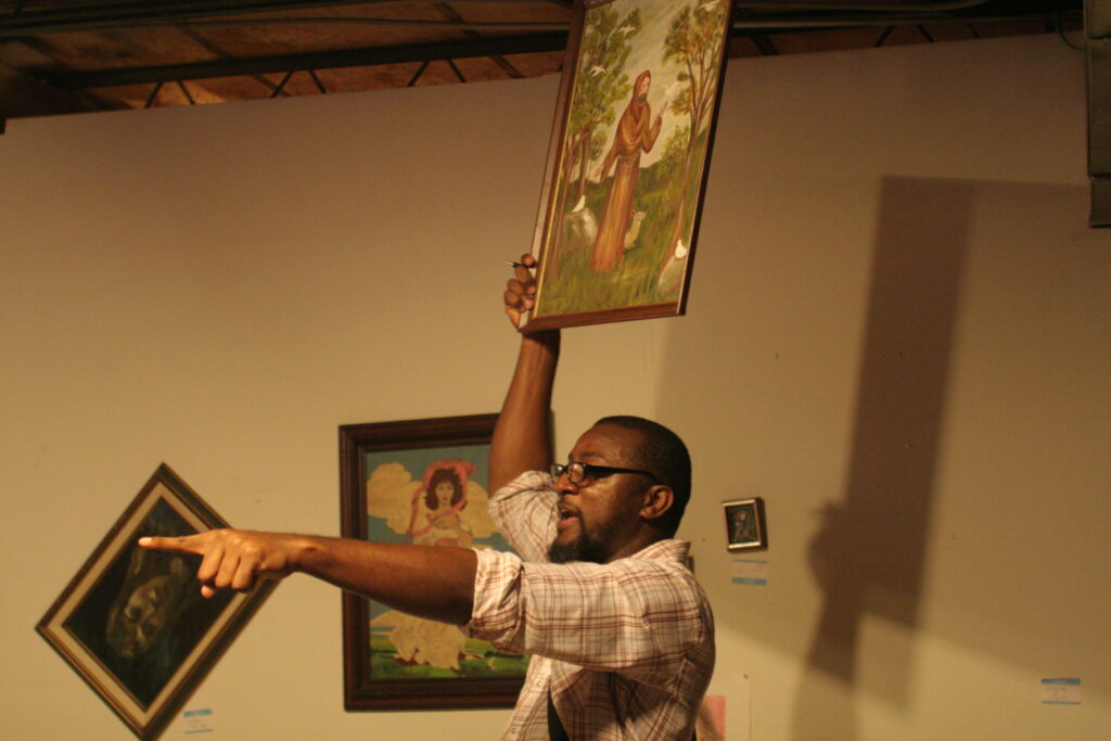 Christopher Blay has worn many hats over the years: artist, writer, editor and curator. Pictured here is Blay's alter ego Frank Artsmarter, who hosted art auctions in Fort Worth. (Courtesy Christopher Blay)