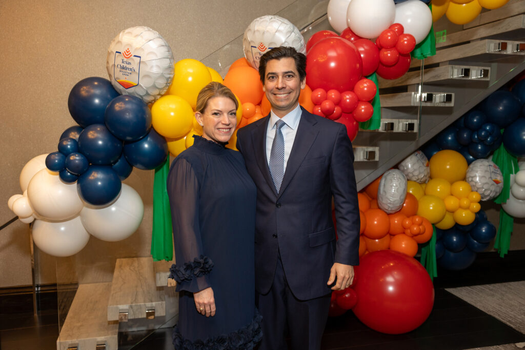 Dr. Renee & Scott Rice at the Texas Children's Houston Open Tee-Off party held in the two-story penthouse suite at Fertitta's Post Oak Hotel.  (Photo by Jenny Antill)