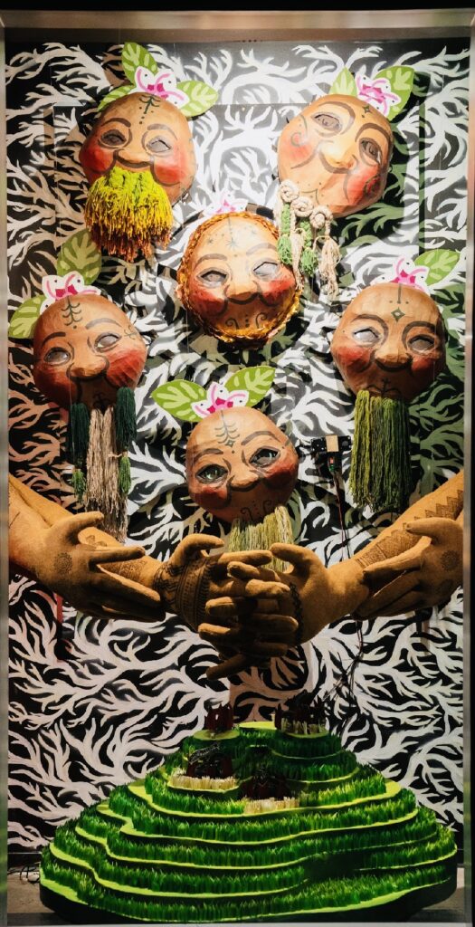 Artist Kill Joy's Ion Building installation "Creation, Current, Solution," 2023. The installation includes animatronic puppets made of painted cardboard. (Photo by Marc Furi Creative)