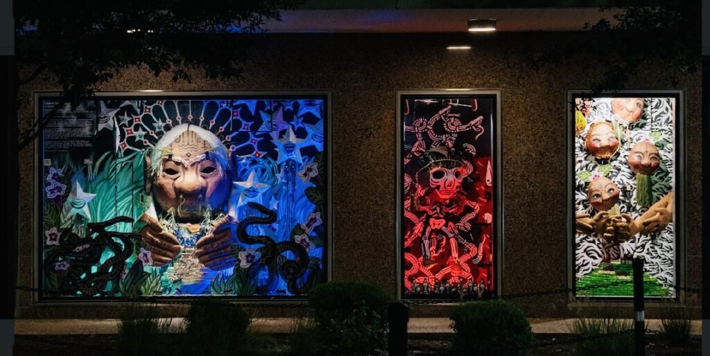 Artist Kill Joy's Ion Building installation "Creation, Current, Solution," 2023. The installation includes animatronic puppets made of painted cardboard. (Photo by Marc Furi Creative)