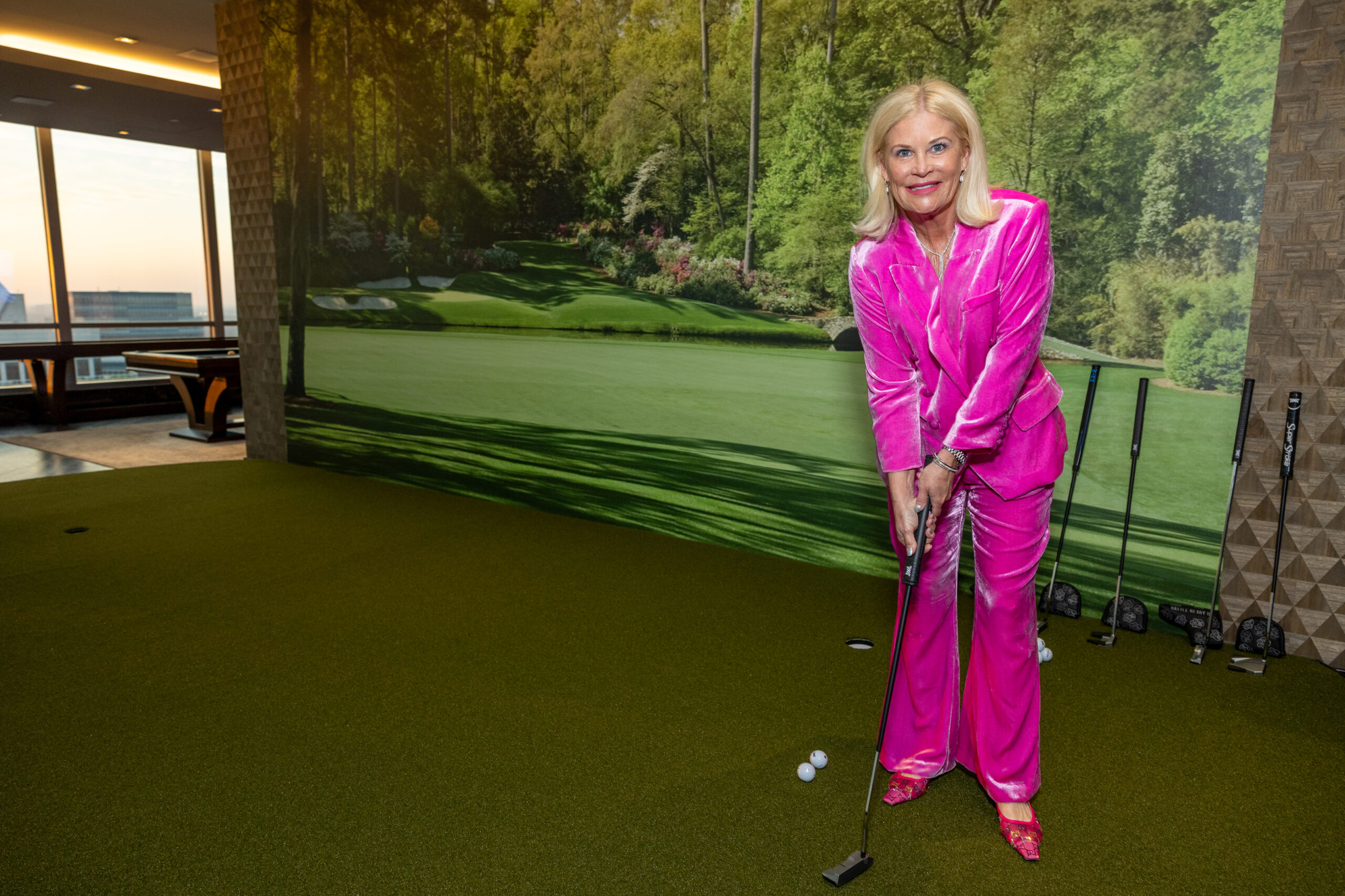 Kelli Blanton practicing her putt at the PXG activation; Photo courtesy of Jenny Antill