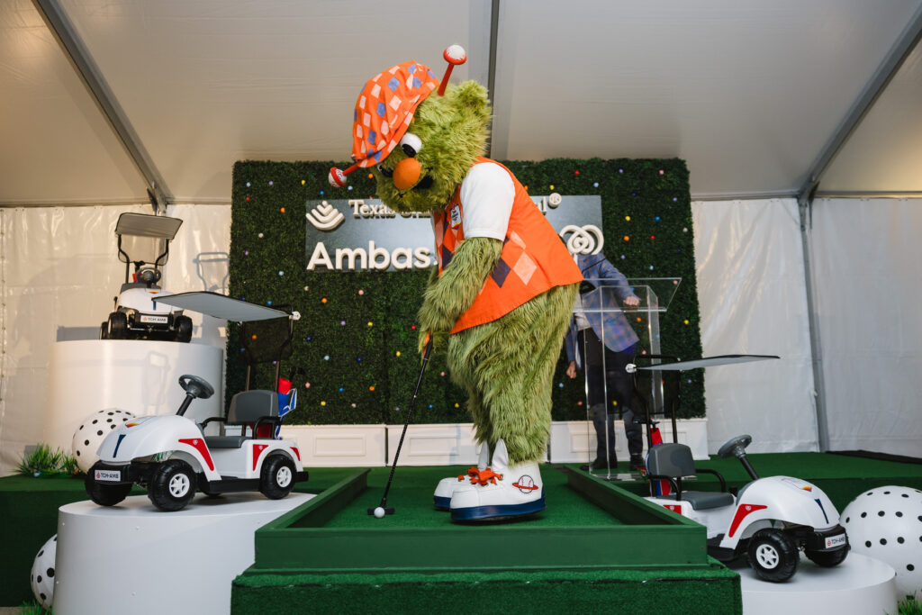 Orbit opening the Texas Children's Hospital 'Glow in the Park'  putt-putt course (Photo courtesy of Texas Children's Hospital)