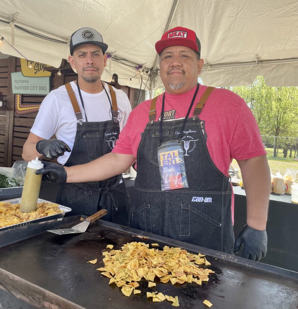 Panther City BBQ co-owners Chris Magallanes and Ernest Morales, shown cooking at the Fort Worth Food Festival, are taking over Bailey's. (Photo by Courtney Dabney)