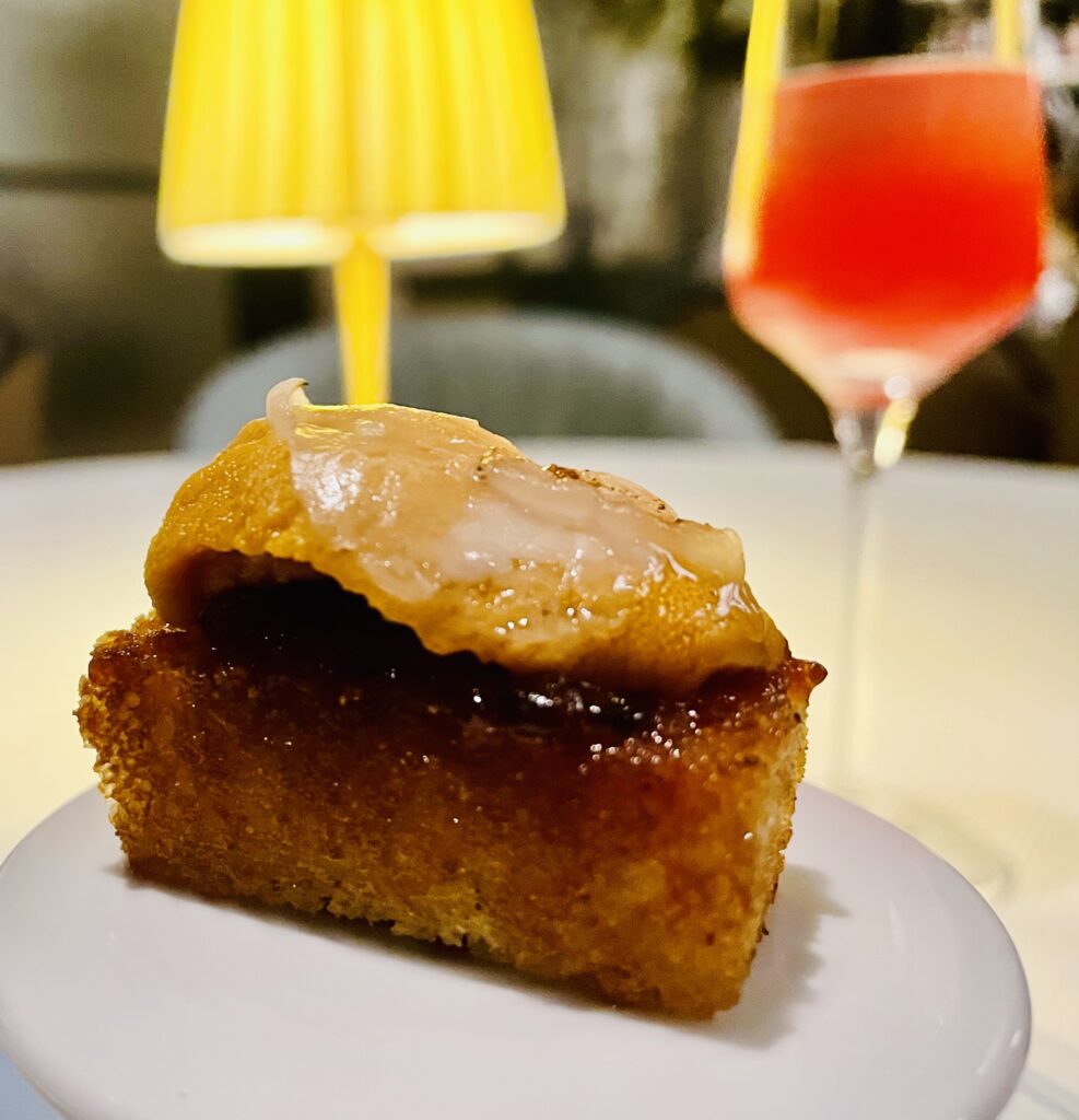  One of the unexpected hors d'oeuvres is the uni toast. (Photo by Courtney Dabney)