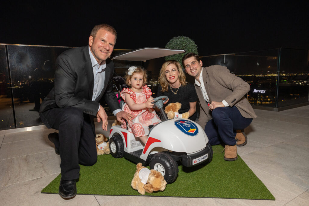 Tilman & Lauren Fertitta with their daughter, Elle, and Blake Fertitta at the Texas Children's Houston Open Tee-Off in the penthouse suite at the Post Oak Hotel. (Photo by Jenny Antill)