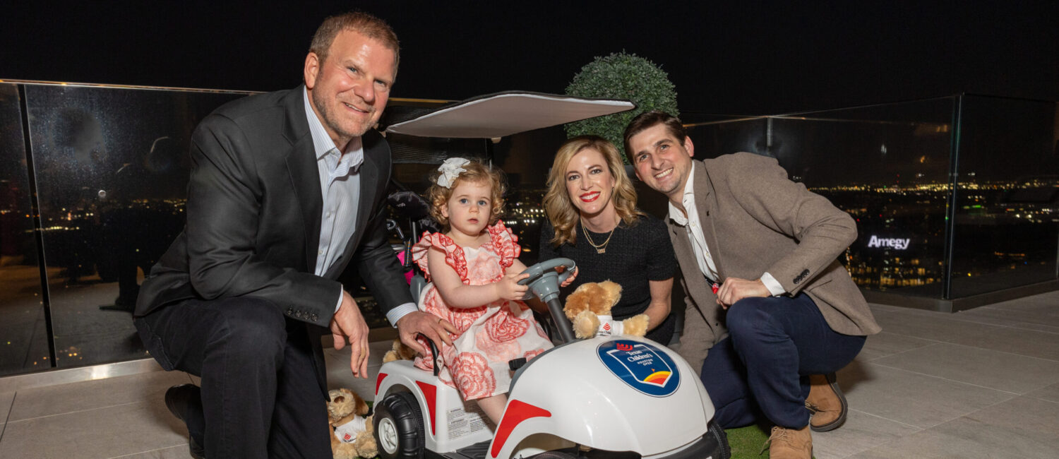 Tilman & Lauren Fertitta with their daughter, Elle, and Blake Fertitta at the Texas Children's Houston Open Tee-Off in the penthouse suite at the Post Oak Hotel. (Photo by Jenny Antill)