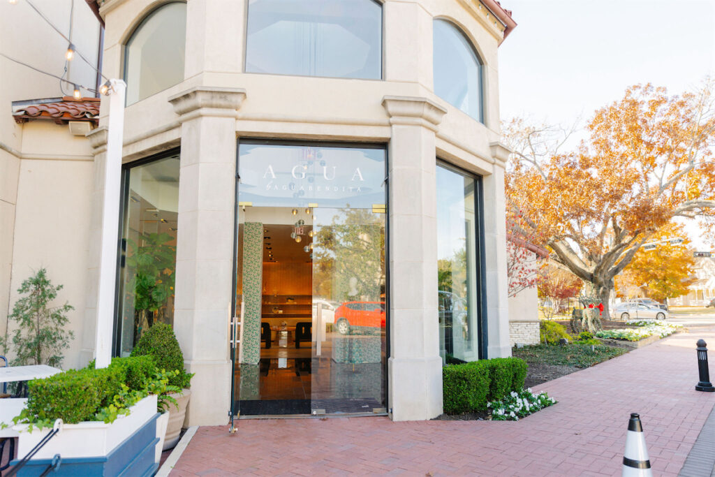 The Agua by Agua Bendita storefront in Dallas' Highland Park Village marks the first U.S. brick-and-mortar location from the luxury resortwear brand. (Photo by Victoria Saperstein)