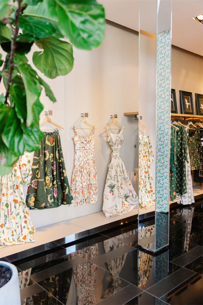 A row of Agua by Agua Bendita dresses, all handmade in Colombia. (Photo by Victoria Saperstein)