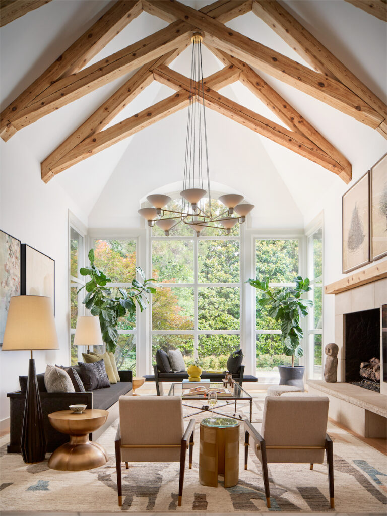 The living room is a later addition, with Jonathan Browning chandelier from The Bright Group. Kara Mann sofa and daybed from Baker. Cocktail table from George Cameron Nash. Arienne Lepretre artwork. (Photo by Stephen Karlisch)