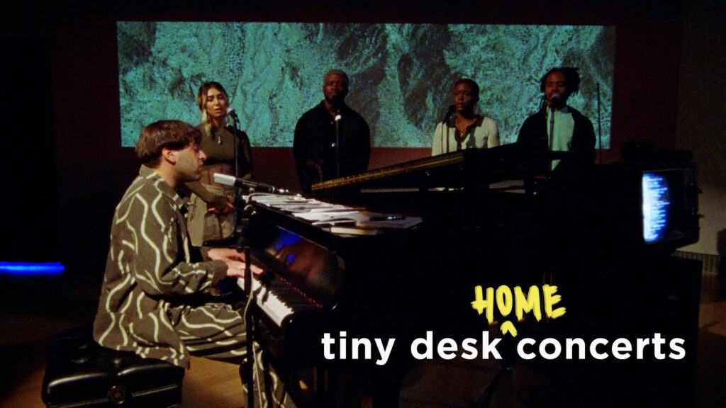 Samora Pinderhughes, pianist and composer, performed with vocalists and musicians during his Tiny Desk (Home) concert for NPR, which debuted April 15, 2022. Songs played during the set include "The Cry/Masculinity," "Holding Cell," "Grief," and "Process." (Courtesy NPR)
