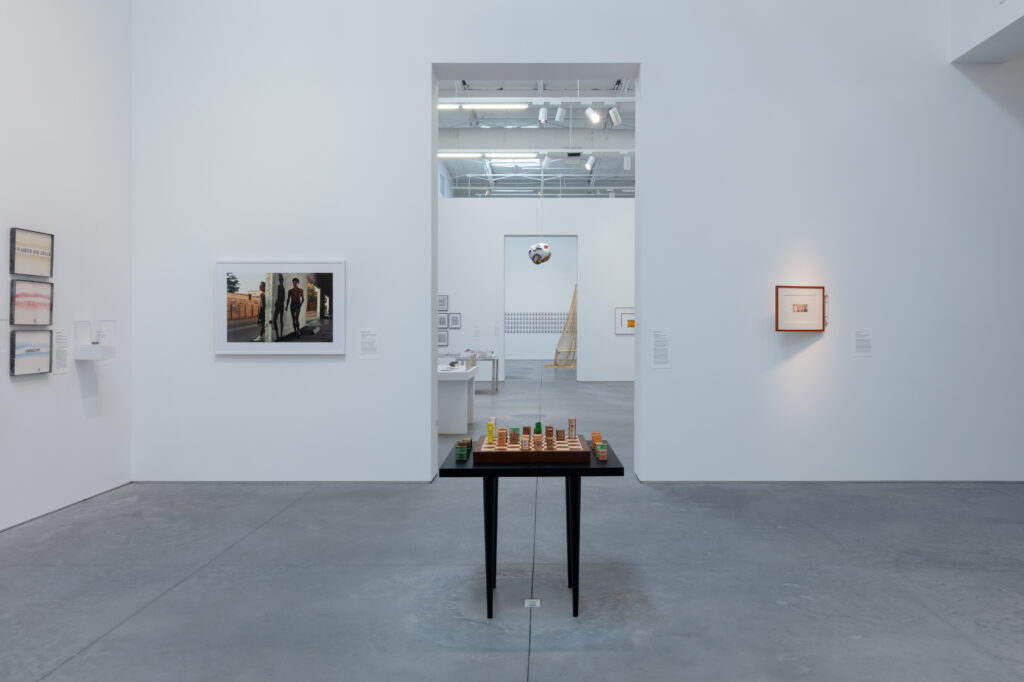 "For What It’s Worth: Value Systems in Art since 1960," The Warehouse, Dallas, installation view with work by Edward Kienholz (3 works), Antonio Vega Macotela, Philip-Lorca diCorcia, Agnieszka Kurant, and Chris Burden
(foreground); Lee Lozano (4 works), Michio Horikawa (6 works), Rirkrit Tiravanija, Eleanor Antin, John Latham (2 works), Steve McQueen, and Cildo Meireles (background), on view through June 29, 2024 (Photo by Kevin Todora)