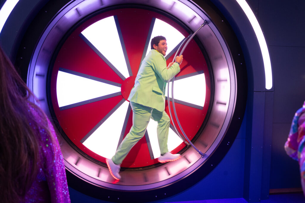 A guest getting into the action in the Weiss Energy Hall at the Houston Museum of Natural Science 'Big Energy!' gala. (Photo by Daniel Ortiz)