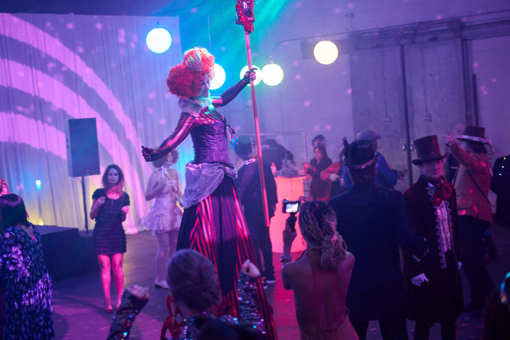 The Red Queen leads the dance party at Fresh Arts Wonder Ball. (Photo by Charlie Horse Photography)