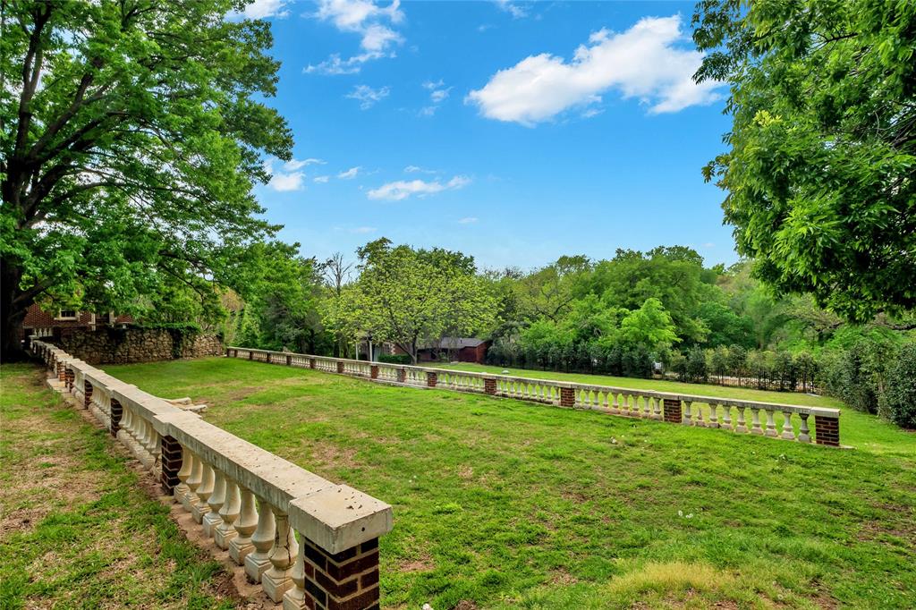 The home offers endless privacy and gardening possibilities with the terraced back lawn.