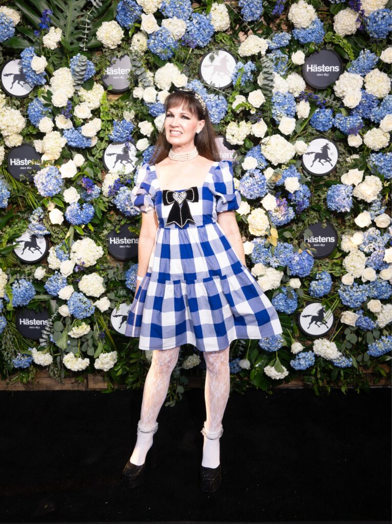 Beth Muecke dressed to match the mattresses at the grand opening of Swedish bedmaker Hästens in River Oaks District. (Photo by Daniel Ortiz)