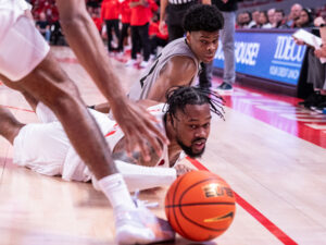 University of Houston power forward J'Wan Roberts knows diving for the basketball is part of the deal if you're a Cougar. (Photo by F. Carter Smith)