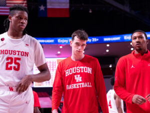 University of Houston head coach Kelvin Sampson visited with Drew Richards, head coach of the UNC Pembroke Braves, his alma mater, before an exhibition contest