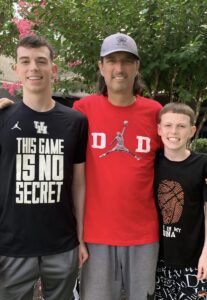 Ryan Elvin, shown here with his dad Scott Elvin and his little brother Jake, thought of his late dad during his University of Houston Senior Day introductions. (@512Doo(