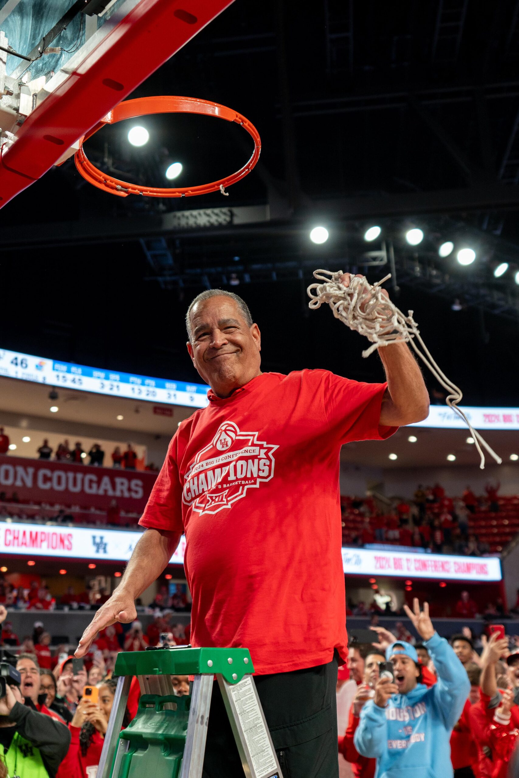 University of Houston coach Kelvin Sampson cut down the net after winning the sweetest of Big 12 titles. Something Bob Huggins never expected to see. (@UHouston)