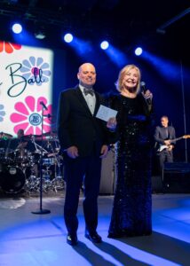 JCB – Jewel Charity’s President Kathy Sneed with son Kirk Sneed. (Photo by Rachel DeLira)