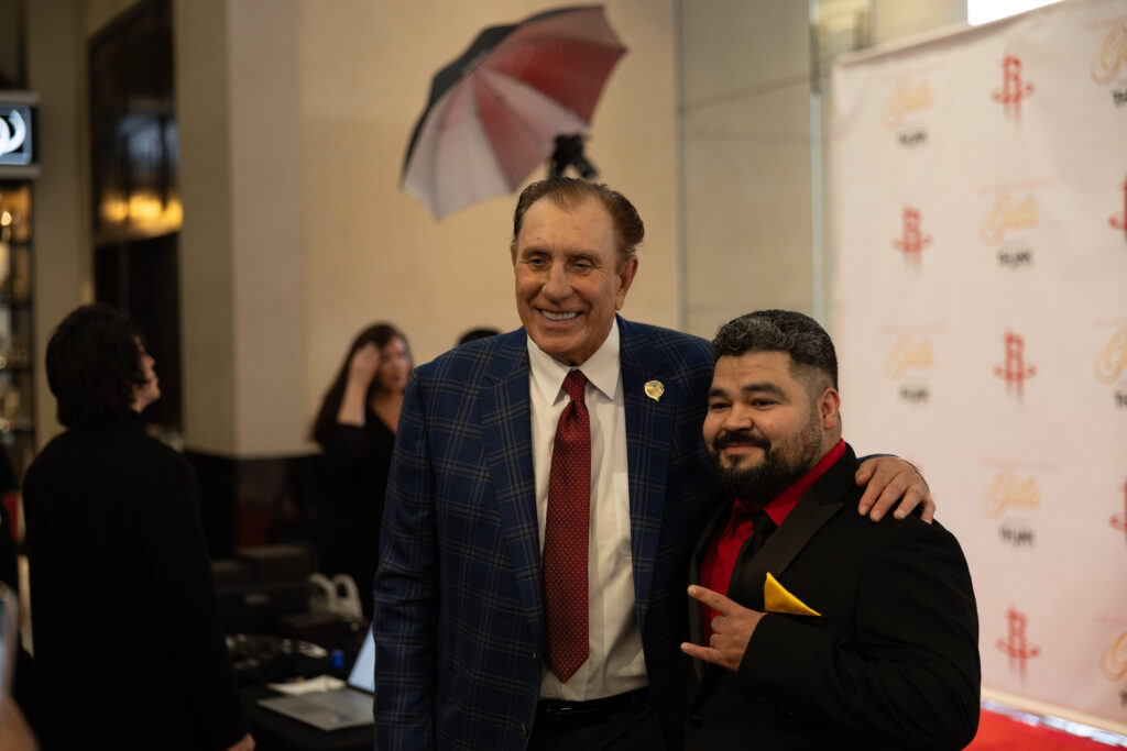Houston Rockets NBA championship coach Rudy Tomjanovich with a guest at the Houston Rockets Clutch City gala held at the Post Oak Hotel.